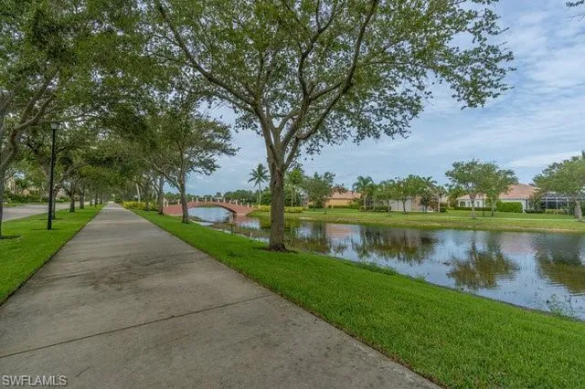 a view of a lake with a garden