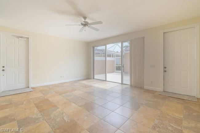 8108 Josefa Way Naples, FL 34114 - Photo 7 of 40 a view of an empty room with a window