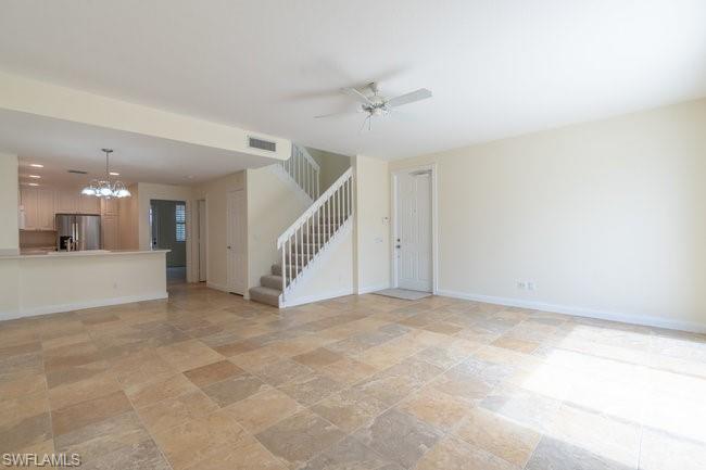 8108 Josefa Way Naples, FL 34114 - Photo 10 of 40 a view of an empty room with wooden floor