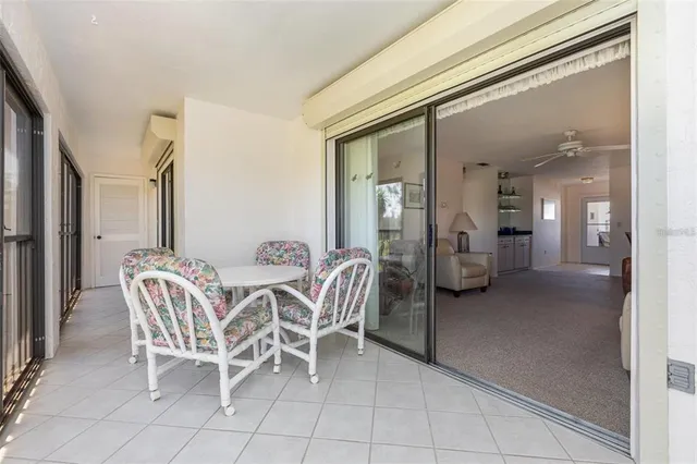 a view of a livingroom with furniture and windows