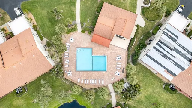 an aerial view of a house having yard
