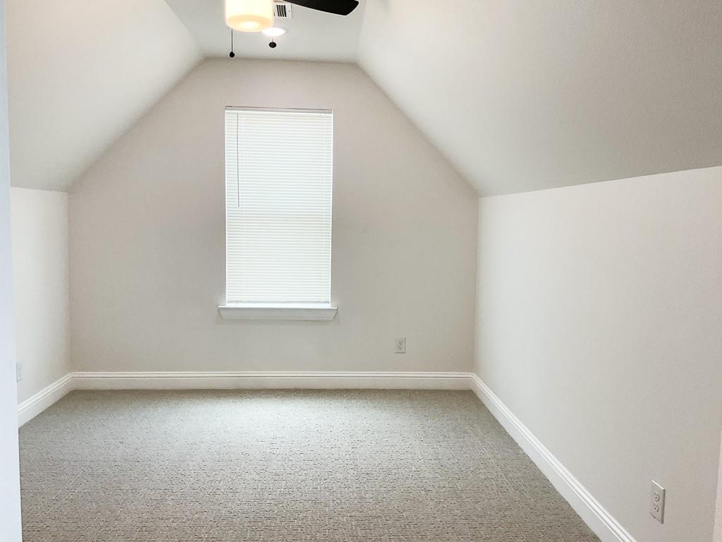 201 Bluff Court Godley, TX 76044 - Photo 14 of 15 an empty room with a window