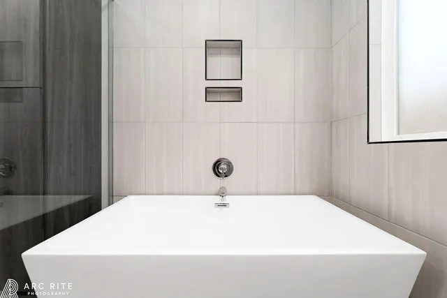 a bathroom with a bathtub
