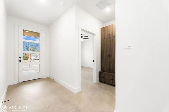 a view of a cabinet and a sink in a room