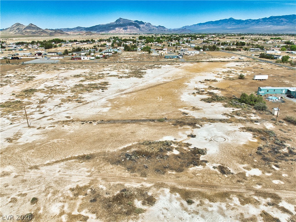 3591 West Wilson Road Pahrump, NV 89048 - Photo 6 of 12 View of mountain background featuring rural landscape and nearby suburban area