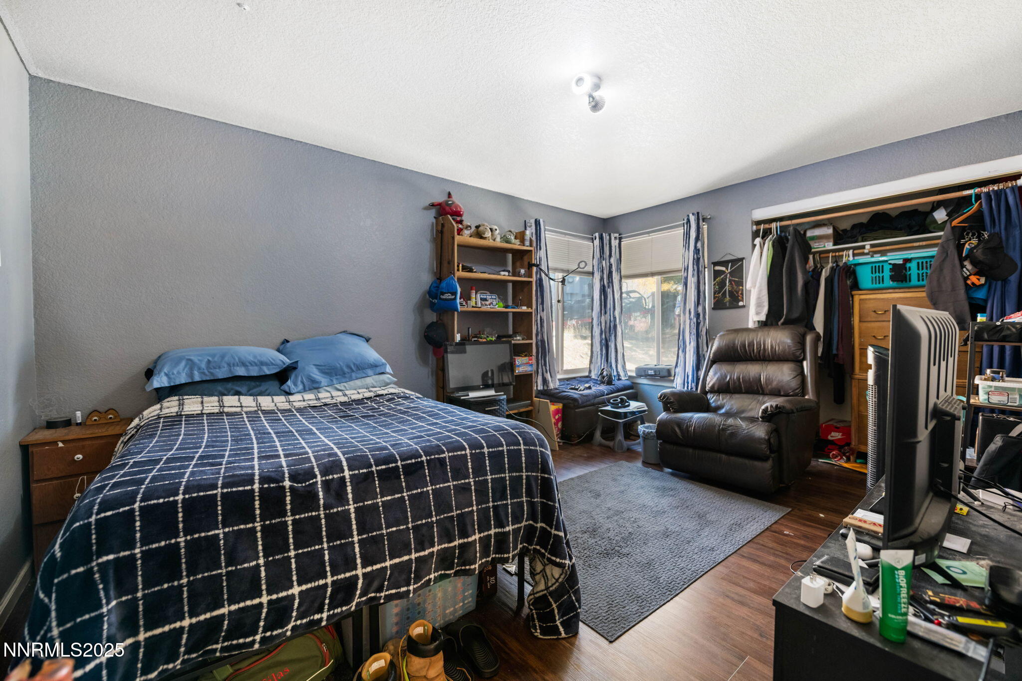 3574 Haystack Drive Carson City, NV 89705 - Photo 14 of 39 a bedroom with furniture and a window
