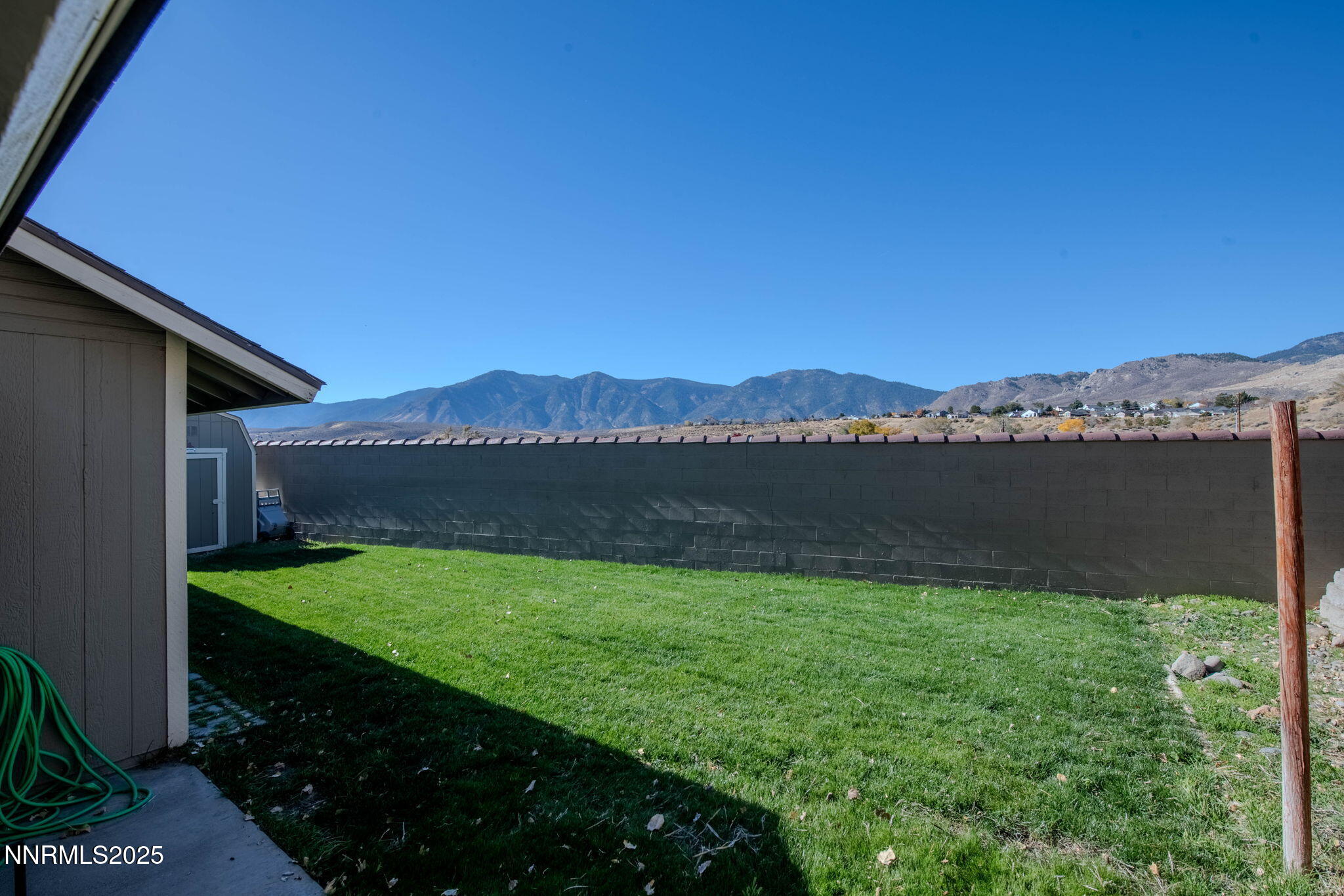 3574 Haystack Drive Carson City, NV 89705 - Photo 36 of 39 a view of a backyard with potted plants