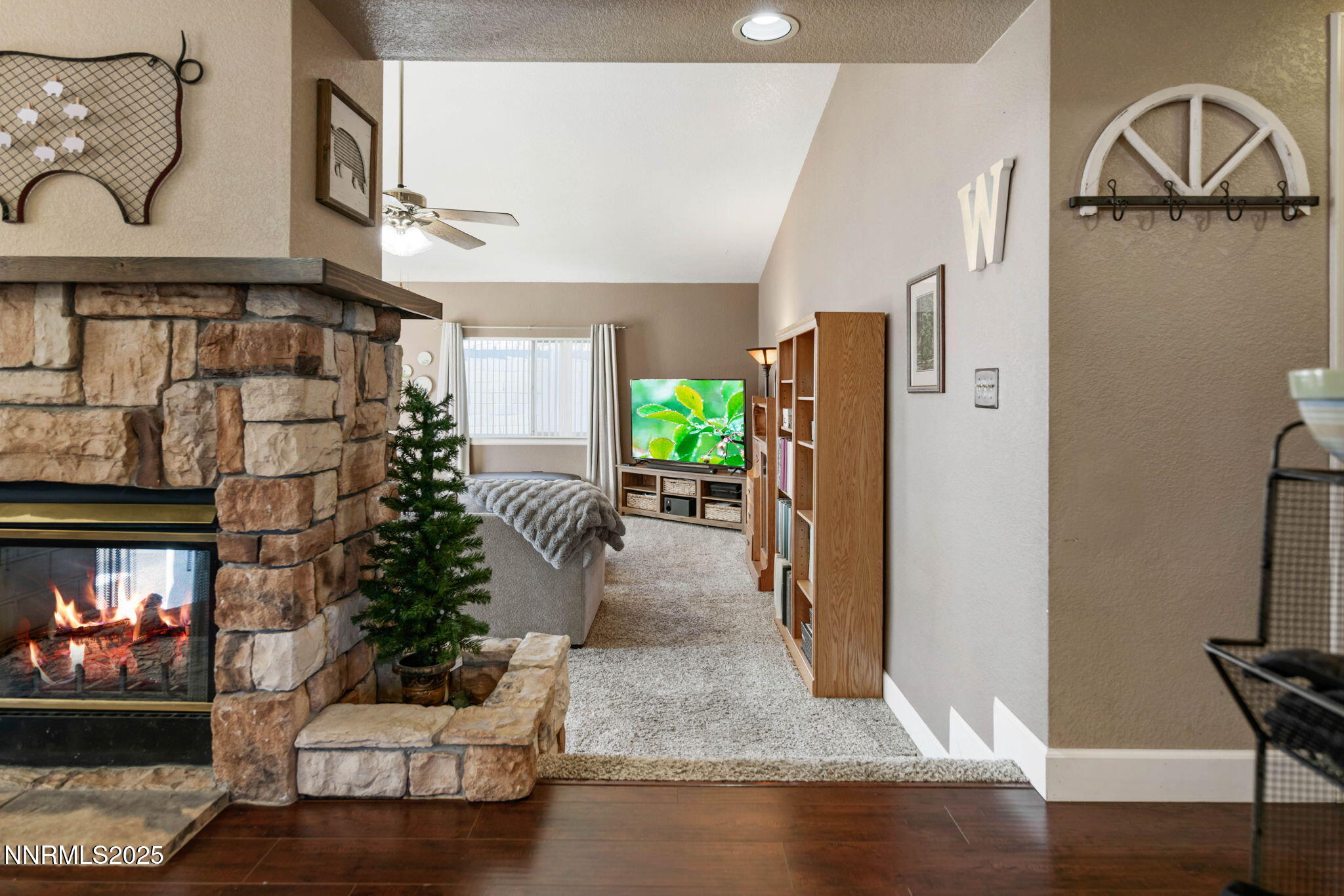 3574 Haystack Drive Carson City, NV 89705 - Photo 6 of 39 a living room with furniture and a fireplace