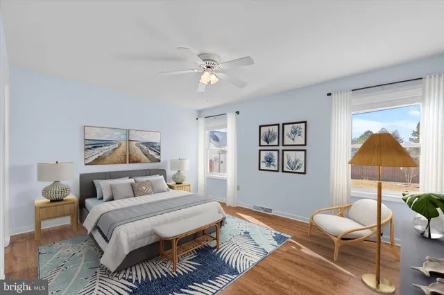 a bedroom with a bed and a couch