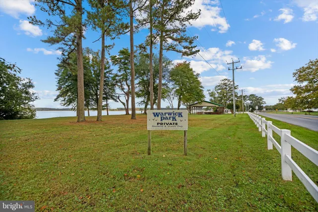 a view of an ocean and a yard