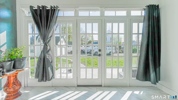 a view of a front door and porch