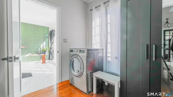a view of living room washer and dryer