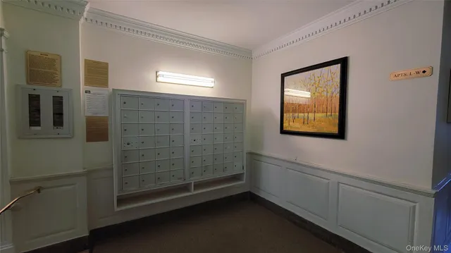 a room with furniture and a chandelier