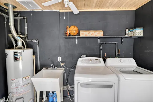 a bathroom with a sink and mirror