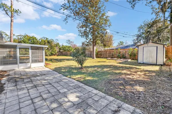 a view of backyard of the house