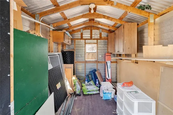 a front view of a house with outdoor seating