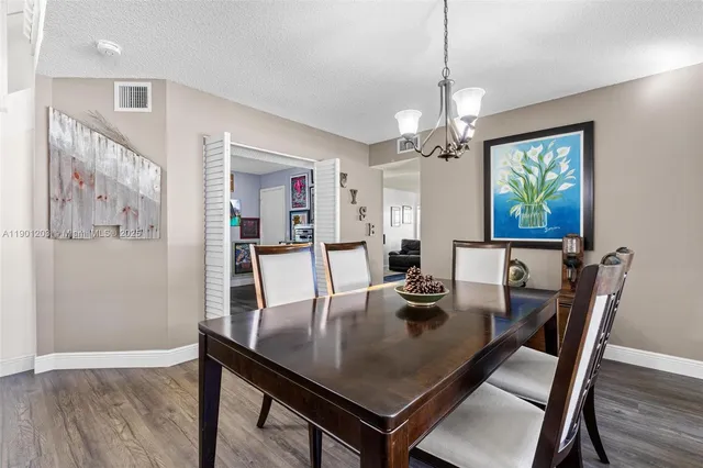 a work room with furniture and wooden floor
