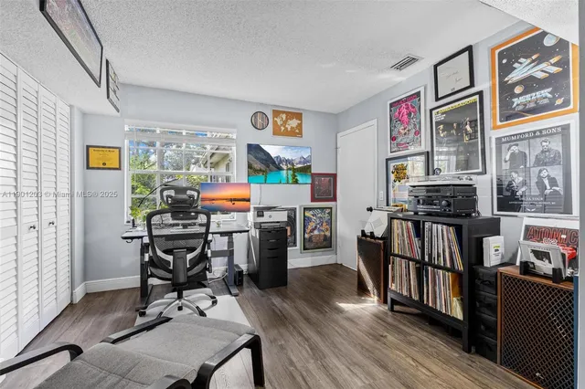 a kitchen with a refrigerator stove and microwave