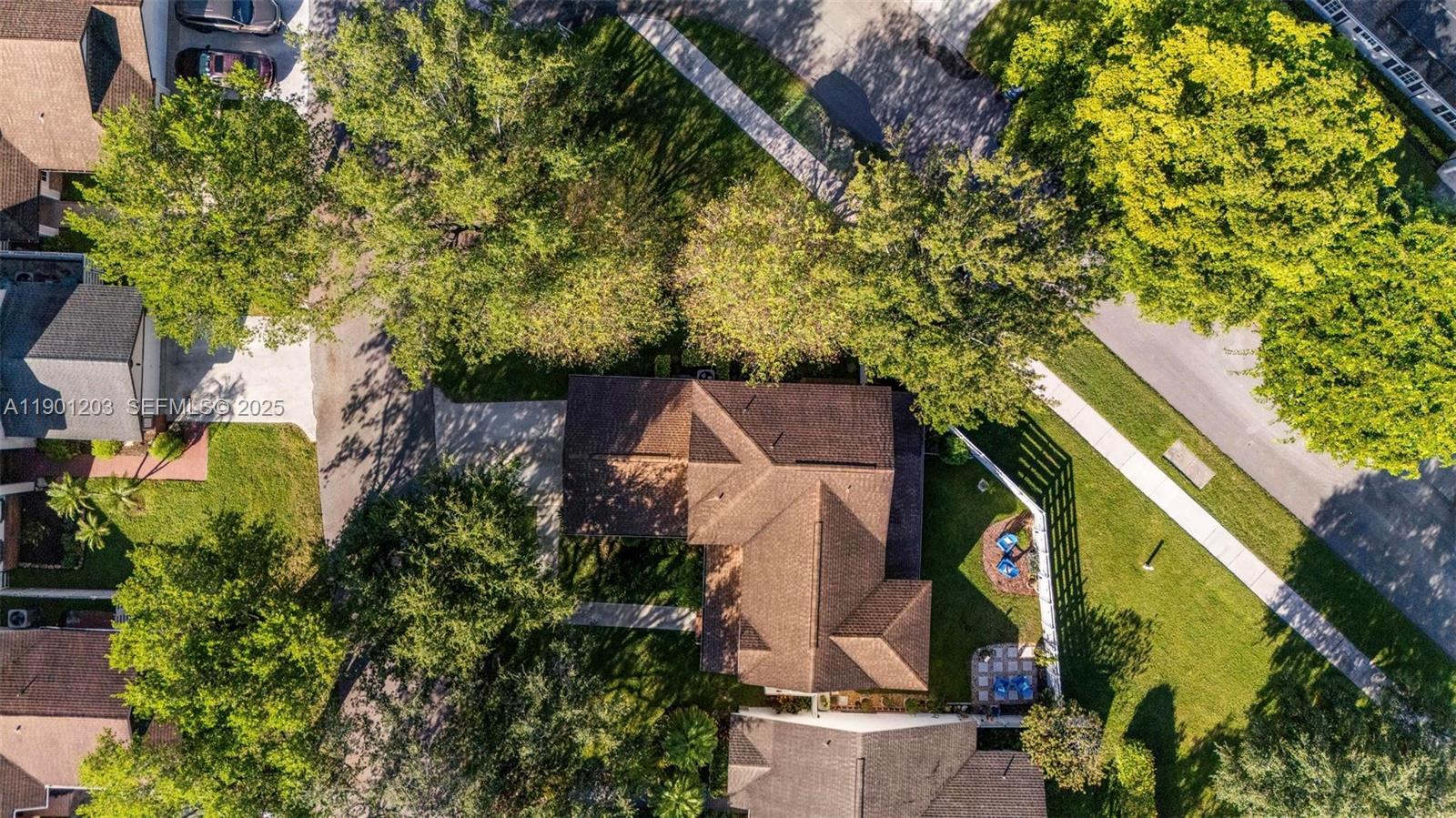 14683 Southwest 145th Terrace Miami, FL 33186 - Photo 38 of 47 an aerial view of house with yard and outdoor seating