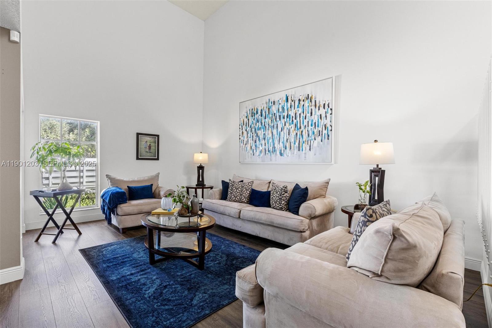 14683 Southwest 145th Terrace Miami, FL 33186 - Photo 10 of 47 a living room with furniture and wooden floor