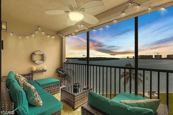 a balcony with furniture