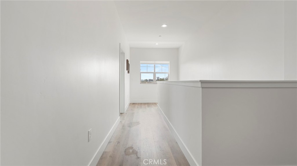 362 South Halcyon Road Arroyo Grande, CA 93420 - Photo 29 of 37 a view of a hallway to a house with wooden floor