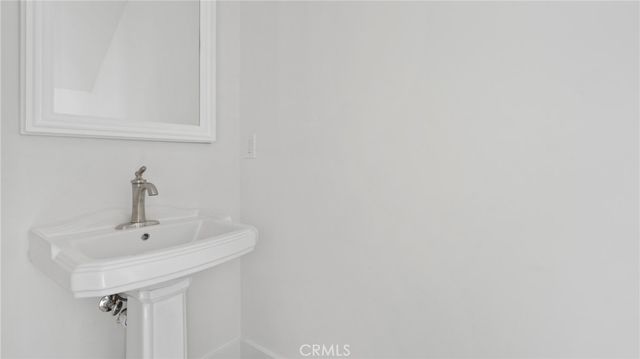 a sink with a mirror