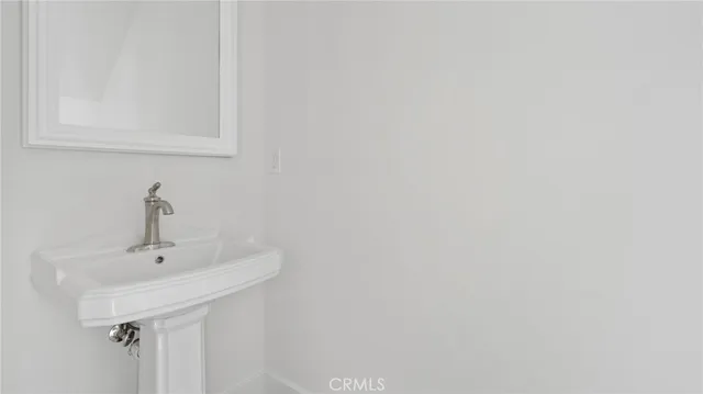 a sink with a mirror