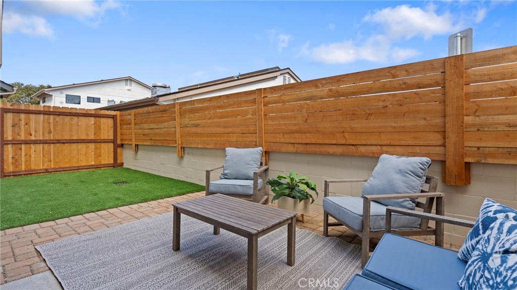 362 South Halcyon Road Arroyo Grande, CA 93420 - Photo 35 of 37 a backyard of a house with table and chairs
