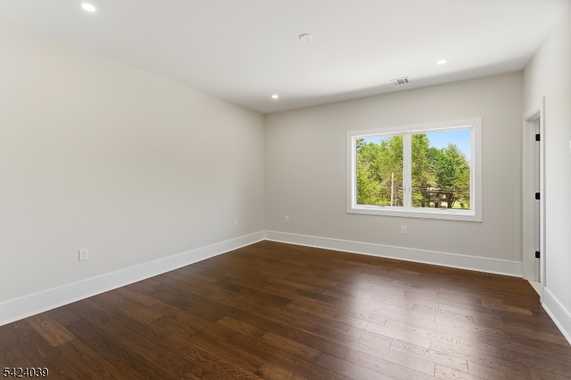 45 Kildee Road Belle Mead, NJ 08502 - Photo 19 of 43 an empty room with wooden floor and windows