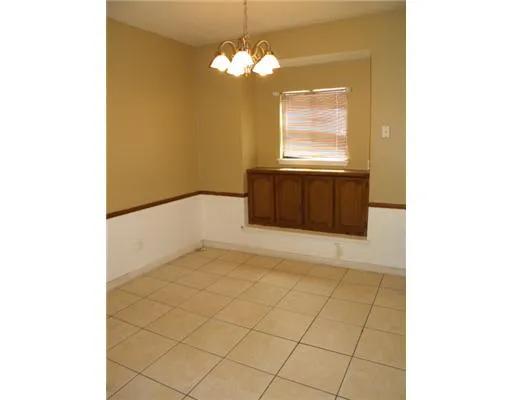 a view of a livingroom with a window