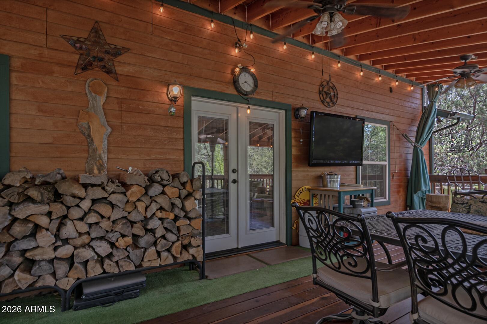 3762 Watertank Road Pine, AZ 85544 - Photo 26 of 38 a view of an chairs and table in a patio