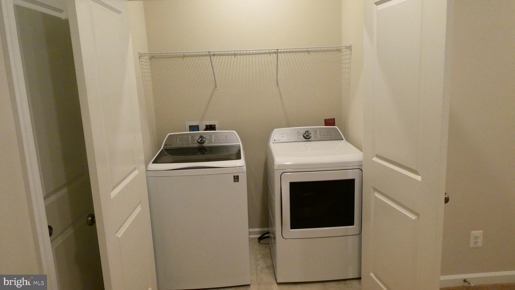 2329 Stephanie Tessa Lane Woodbridge, VA 22191 - Photo 14 of 50 a utility room with dryer and washer