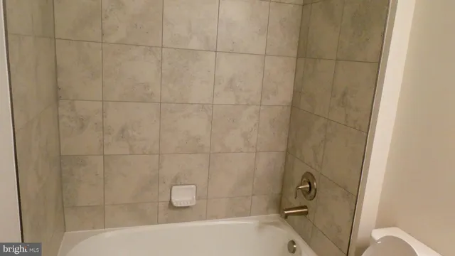a bathroom with a bathtub