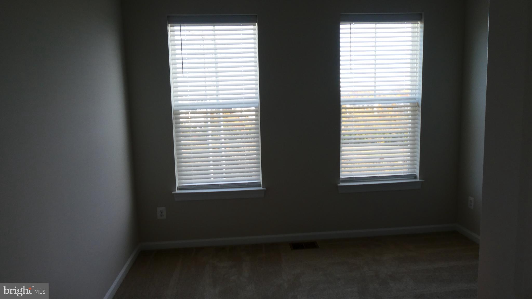 2329 Stephanie Tessa Lane Woodbridge, VA 22191 - Photo 18 of 50 a room that has a window in it