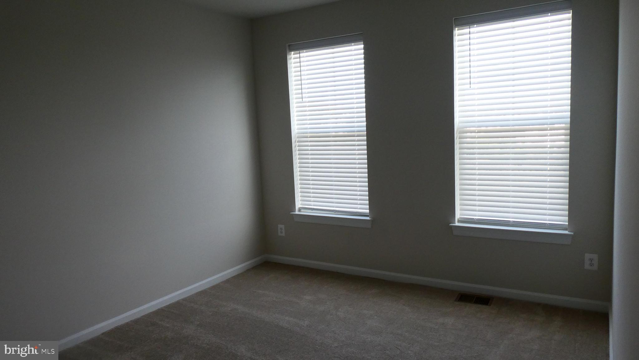 2329 Stephanie Tessa Lane Woodbridge, VA 22191 - Photo 20 of 50 a view of an empty room with a window