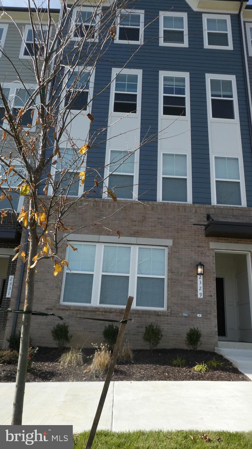 2329 Stephanie Tessa Lane Woodbridge, VA 22191 - Photo 26 of 50 a front view of a building