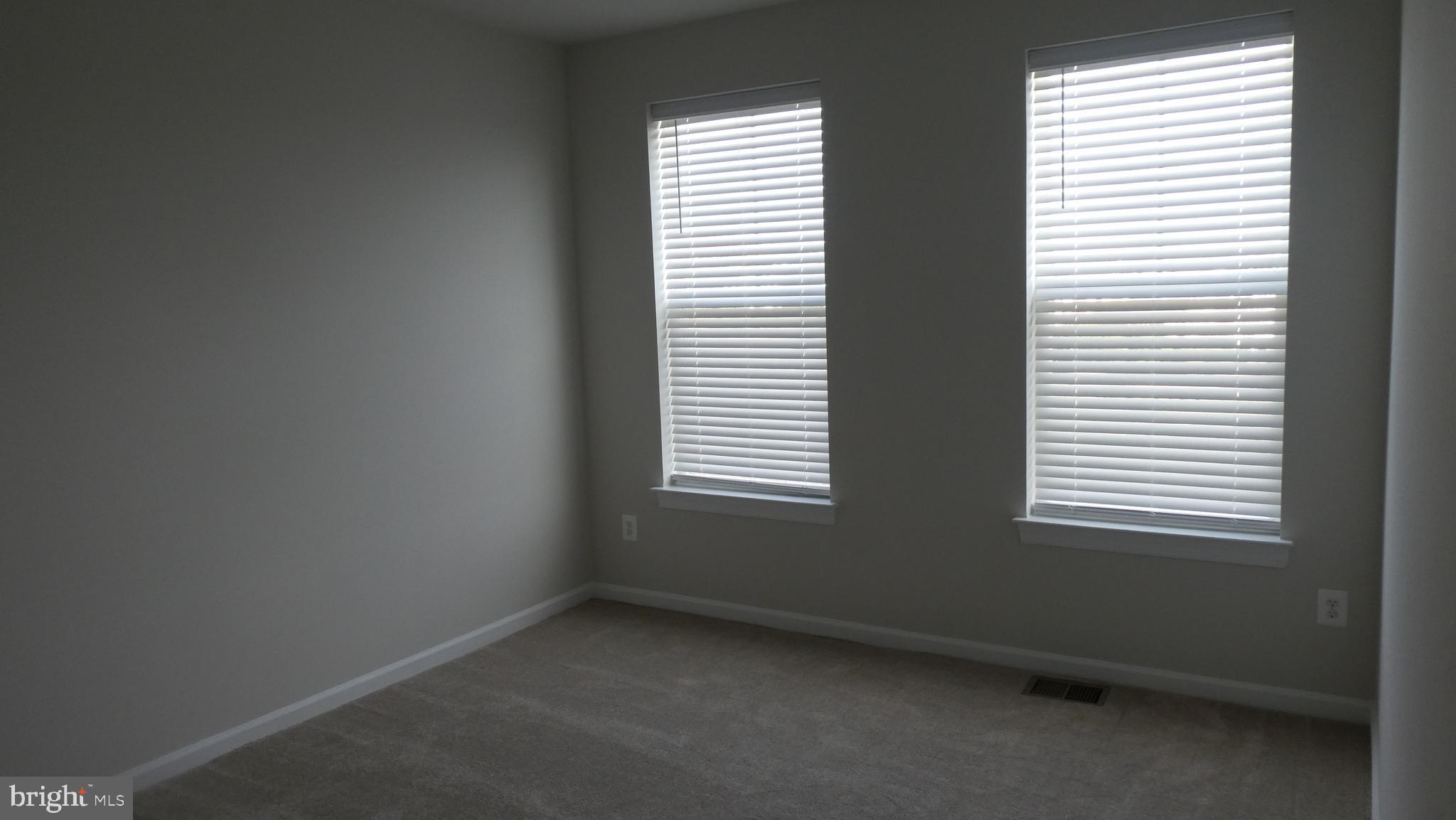 2329 Stephanie Tessa Lane Woodbridge, VA 22191 - Photo 36 of 50 an empty room with a window