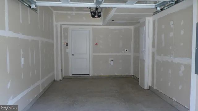 a kitchen with a sink and a refrigerator