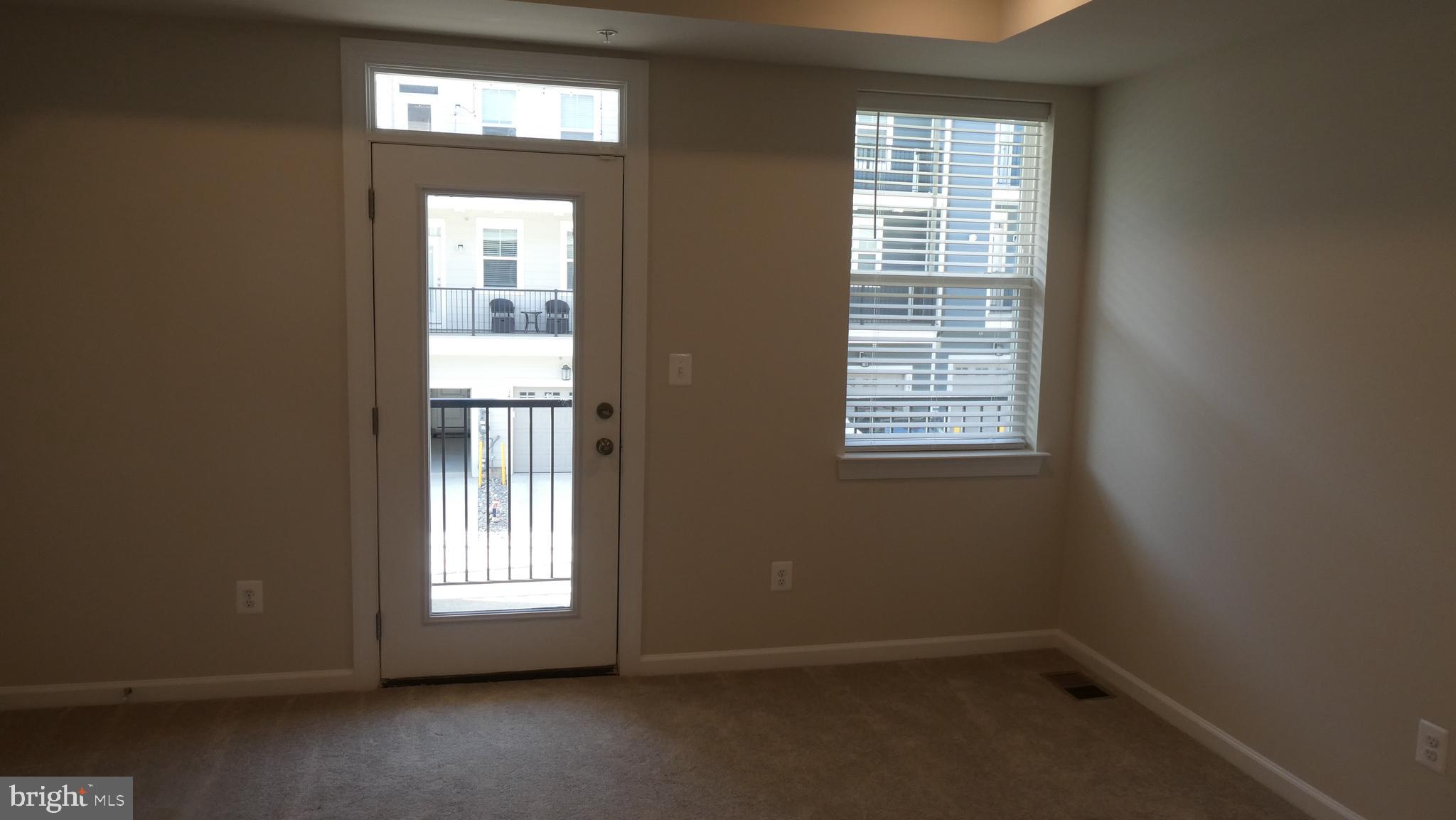 2329 Stephanie Tessa Lane Woodbridge, VA 22191 - Photo 43 of 50 an empty room with windows