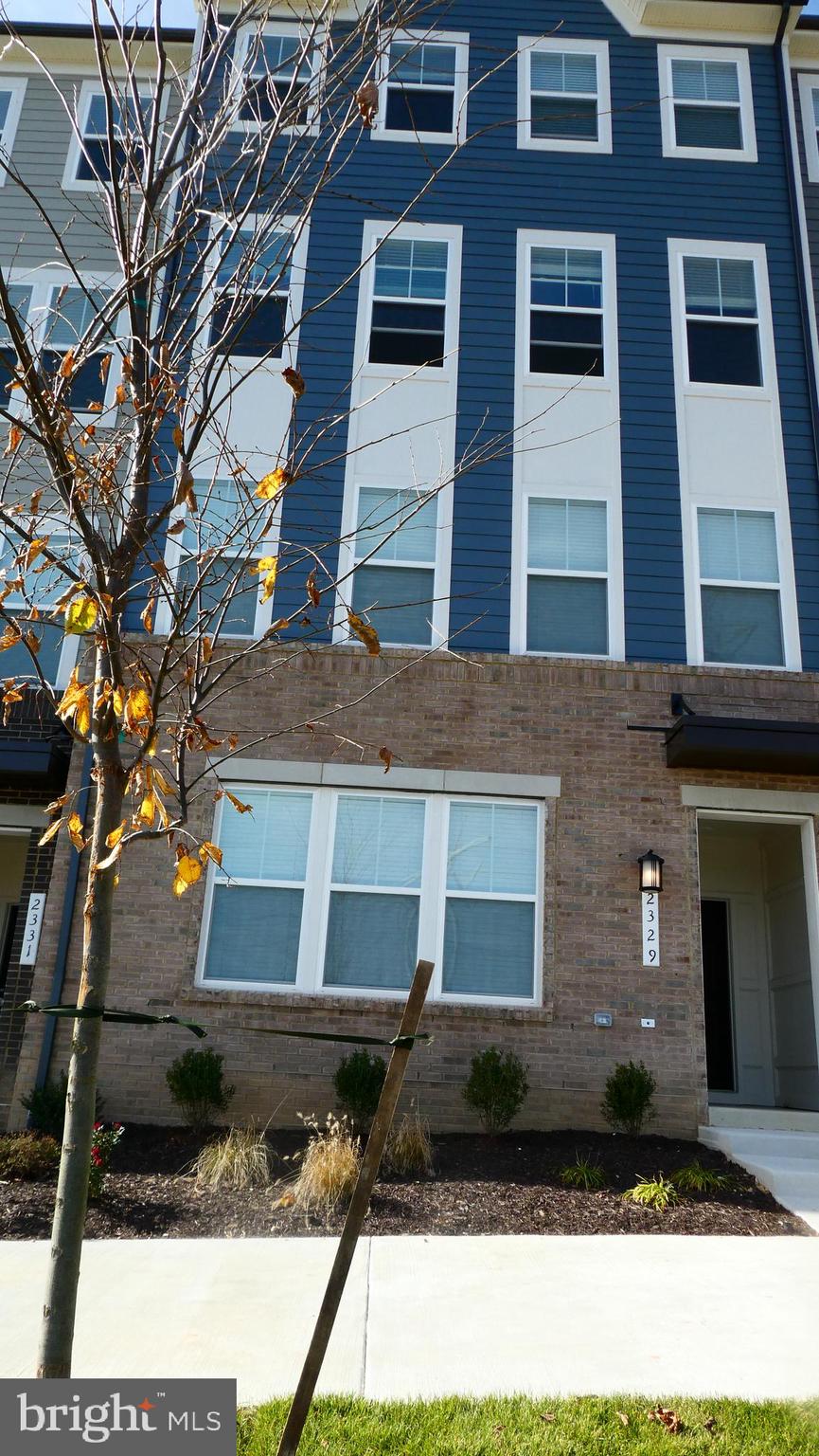 2329 Stephanie Tessa Lane Woodbridge, VA 22191 - Photo 48 of 50 a front view of a building