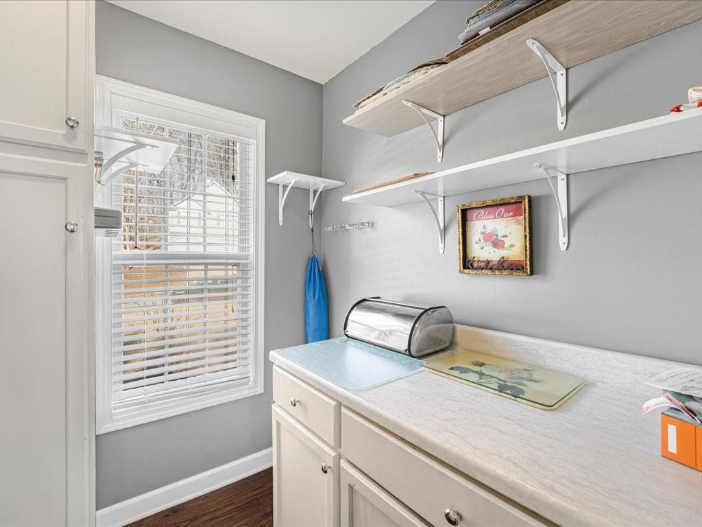 76 Kessle Lane Dallas, GA 30132 - Photo 12 of 33 a bedroom with a bed and a window