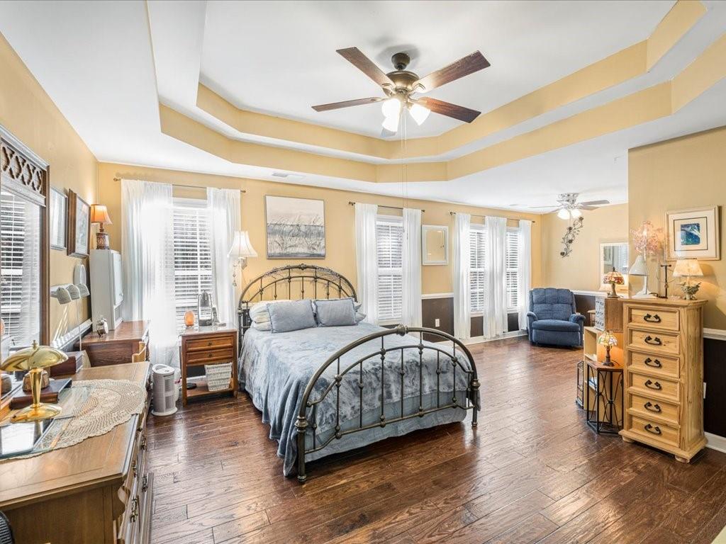 76 Kessle Lane Dallas, GA 30132 - Photo 18 of 33 a bedroom with a large bed and furniture