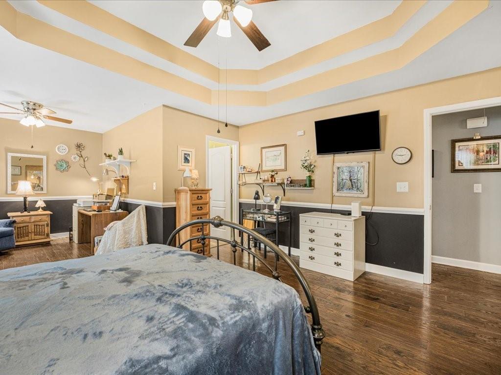 76 Kessle Lane Dallas, GA 30132 - Photo 19 of 33 a bedroom with furniture and a flat screen tv