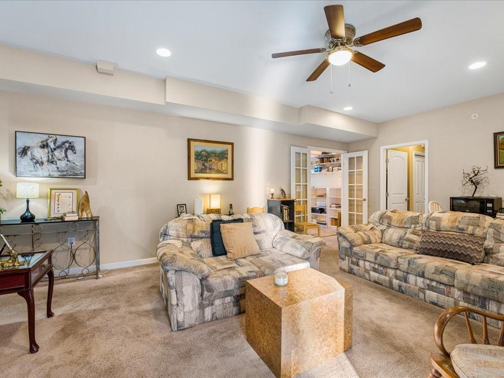 76 Kessle Lane Dallas, GA 30132 - Photo 26 of 33 a living room with furniture and a large window