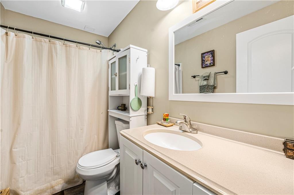 76 Kessle Lane Dallas, GA 30132 - Photo 29 of 33 a bathroom with a sink toilet and shower
