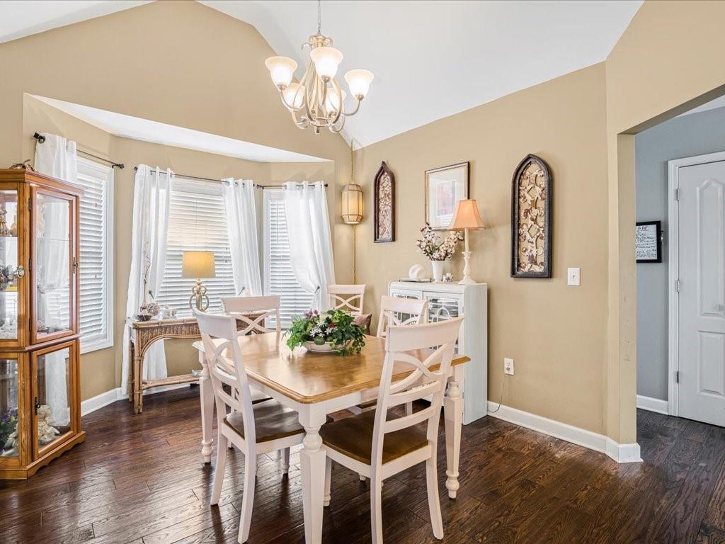 76 Kessle Lane Dallas, GA 30132 - Photo 6 of 33 a view of a dining room with furniture window and wooden floor