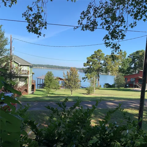 a view of a golf course with a house