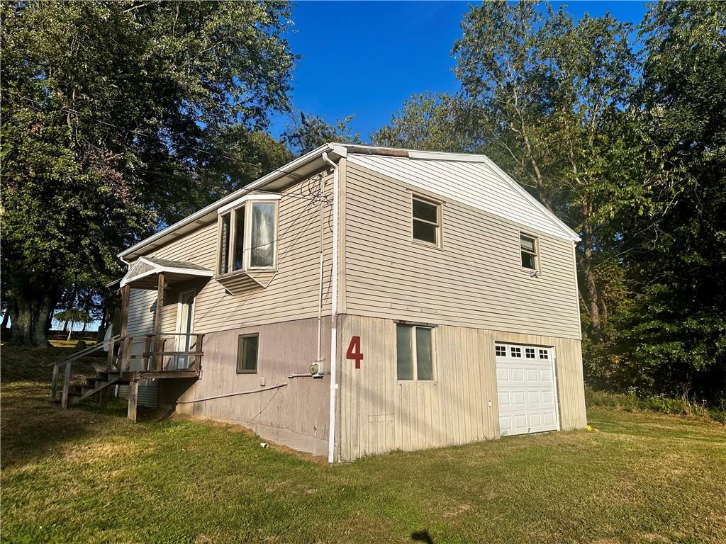 4 Wabash Avenue Hickory, PA 15340 - Photo 1 of 19 a view of a white house with a yard