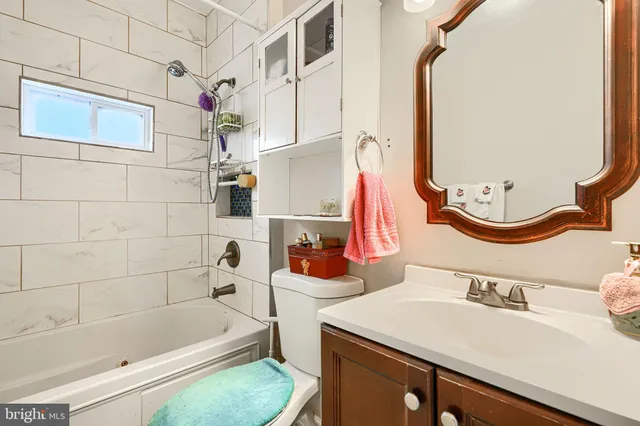 a bathroom with a sink and a bathtub